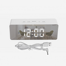 nzmegabuy white digital LED mirror alarm clock with USB cable and temperature display on a plain background