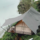 nzmegabuy heavy-duty silver and green polyethylene tarpaulin providing shade over a wooden deck and tent structure