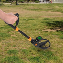nzmegabuy hobby metal detector with LCD screen and orange accents being used in a grassy park