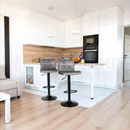 nzmegabuy set of two grey velvet bar stools with swivel seats and adjustable gas lift in a modern kitchen