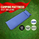 nzmegabuy blue self-inflating camping mat with built-in pillow, 5cm thick, laid out on green grass.