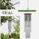 nzmegabuy 27-tube silver metal wind chime with deep resonant tones, hanging in a garden for outdoor decor.