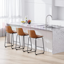 nzmegabuy Ichairium modern bar stools in whisky brown PU leather with black steel frames at a marble kitchen island