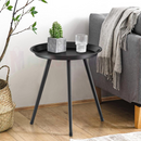 nzmegabuy round black metal side table with a tray-style top and three legs, styled next to a grey sofa.