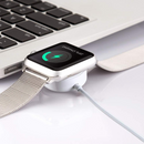 nzmegabuy white USB-C magnetic fast charging cable connected to an Apple Watch resting on a laptop keyboard