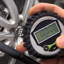 nzmegabuy digital tire inflator with pressure gauge held in hand showing a clear LCD display for accurate readings