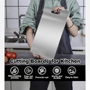 nzmegabuy stainless steel cutting board with a smooth, hygienic surface held by a person in a kitchen setting