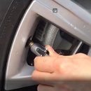 nzmegabuy digital tire inflator gun with pressure gauge being used to inflate a car tire
