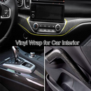 nzmegabuy 5D gloss black carbon fibre vinyl wrap applied to a car dashboard, gear shifter, and interior door handle.