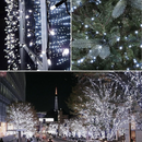 nzmegabuy 12m solar fairy lights with 100 cold white LEDs illuminating trees and outdoor displays at night
