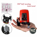 nzmegabuy 360-degree self-leveling red line laser level held in hand, showing compact design and adjustment knobs.