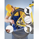 nzmegabuy mountain bike disc brake pads being installed by a mechanic on a yellow bicycle