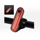 nzmegabuy USB rechargeable red LED bicycle tail light mounted on a bike seat post with four lighting modes