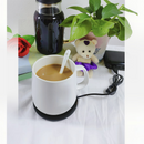 nzmegabuy black USB coffee mug warmer with three heat settings under a white ceramic mug on a desk