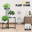nzmegabuy 3-tier foldable black metal plant stand displaying three potted plants in a modern indoor living space