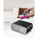 nzmegabuy black 3-in-1 alarm clock with wireless charging pad, Bluetooth speaker, and LED display showing time