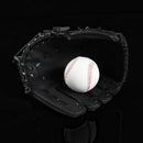 nzmegabuy black PVC and PU leather baseball glove with a white baseball inside, featuring a trap-style pocket.