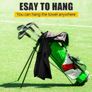 nzmegabuy black waffle pattern microfiber golf towel hanging from a green golf bag on a sunny course