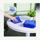 nzmegabuy blue microfiber cleaning cloths being used to wipe a white table, featuring a gentle on delicate surfaces icon