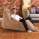 nzmegabuy LAZY BEAN brown velvet floor cushion cover providing comfortable seating for a man in a lounge setting
