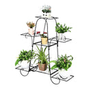 nzmegabuy CREAVITA 6-tier black steel plant stand holding various potted plants in an indoor or outdoor setting