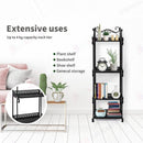 nzmegabuy CREAVITA 4-tier black steel plant stand with decorative scrollwork, shown in a living room setting.