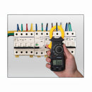 nzmegabuy digital clamp meter measuring AC current on a circuit breaker panel with a clear LCD display