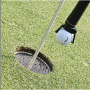 nzmegabuy black plastic golf ball retriever tool attached to a putter grip, lifting a golf ball from a green.