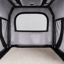 Interior view of a grey nzmegabuy portable soft dog travel crate with mesh windows and a removable fleece floor mat.