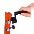 nzmegabuy guitar string winder tool being used on a wooden guitar headstock for maintenance