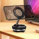 nzmegabuy magnetic car phone holder with 360-degree rotation and zinc alloy base mounted on a wooden desk