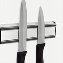 nzmegabuy silver wall-mounted magnetic knife strip holding two kitchen knives against a white wall