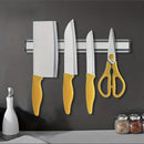 nzmegabuy silver wall-mounted magnetic knife strip holding various kitchen knives and scissors on a dark wall