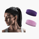 nzmegabuy unisex sports sweatband in black, purple, and light purple, worn by a woman during a workout