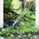 nzmegabuy stainless steel curved scissors trimming aquatic plants in a lush planted aquarium tank