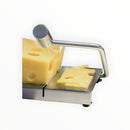 nzmegabuy stainless steel cheese cutting board with integrated wire slicer slicing a block of Swiss cheese