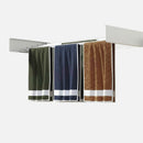 nzmegabuy white wall-mounted folding clothes drying rack with five bars holding three textured towels