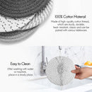 nzmegabuy round woven cotton trivet mats in grey and white, shown stacked and being rinsed under a kitchen tap.